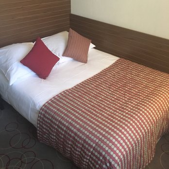Qubus Hotel Kraków - Double bed in the single room. Looks comfy! - Hotels Near Me - Kraków, Massachusetts