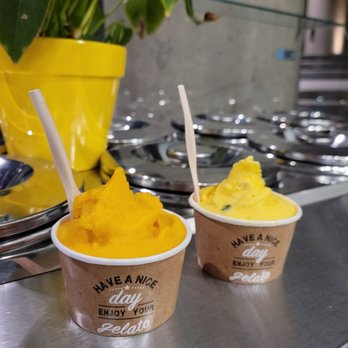 Passione Gelato - Fresh mango (left), Akbar mashti (right), both single scoop $6.50 - Ice Cream & Frozen Yogurt Near Me - Vancouver, British Columbia Passione Gelato - Fresh mango (left), Akbar mashti (right), both single scoop $6.50 - Ice Cream & Frozen Yogurt Near Me - Vancouver, British Columbia