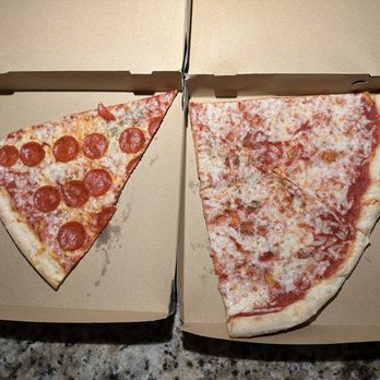 Mario's Pizza - Left: Pepperoni Pizza Slice Right: 2 of Cheese Pizza Slice picked up to take back and enjoy. - Pizza Near Me - Clemmons, North Carolina