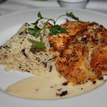 Peohe's - crab stuffed tilapia with rice pilaf and capers sauce *courtesy of Frank Pak* - Seafood Near Me - Coronado, California Peohe's - crab stuffed tilapia with rice pilaf and capers sauce *courtesy of Frank Pak* - Seafood Near Me - Coronado, California