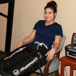 Elite Performance Chiropractic - Jessica trying out our Norma Tec Recovery Boots!