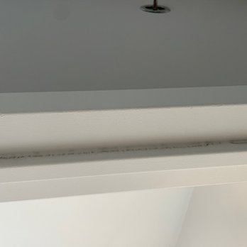 Elite Supreme Cleaning - Door frame before - Home Cleaning Near Me