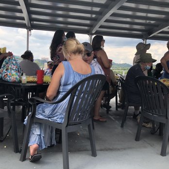 Southern Belle Riverboat - Third deck of the boat where passengers line up for drinks  . No space between any tables or chairs or distancing in line. - Tours Near Me - Chattanooga, Tennessee