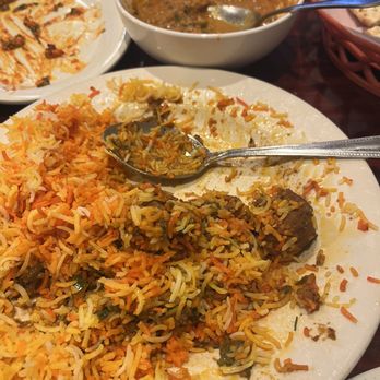 Namaste - Half eaten goat biryani and in the back, the paneer - Indian Near Me - Spring, Texas