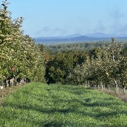 Autumn Hills Orchard - View from Center HIll. North and Couth Uncanoonucs in background located in Goffstown, NH approx 25 miles to the north