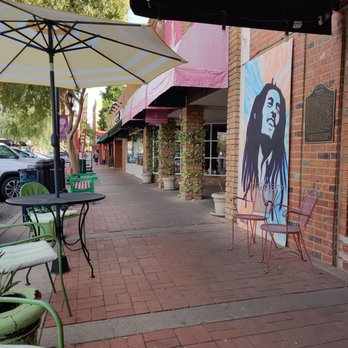 Coyote Oaties - a street scene with tables and chairs - Desserts Near Me - Glendale, Arizona Coyote Oaties - a street scene with tables and chairs - Desserts Near Me - Glendale, Arizona