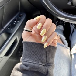 Yellow gel polish with chrome powder = glazed spring nails!