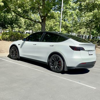 Genesis Window Tinting - Tesla Model Y Performance. Matte PPF, pillar delete, smoked headlights / taillights. Ceramic window tint. - Home Window Tinting Near Me - Elk Grove, California