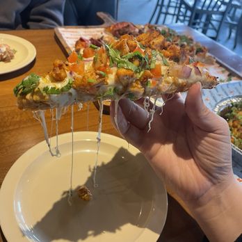 Tandoori Pizza - slice of chicken tikka pizza - Pizza Near Me - San Jose, California Tandoori Pizza - slice of chicken tikka pizza - Pizza Near Me - San Jose, California