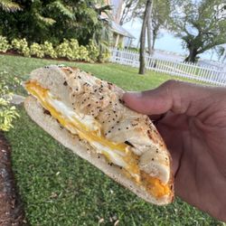 Broadway Bagels & Deli - Bialy bagel with egg and cheese. Absolutely fresh bagel and by far the best egg sandwich I've ever had.