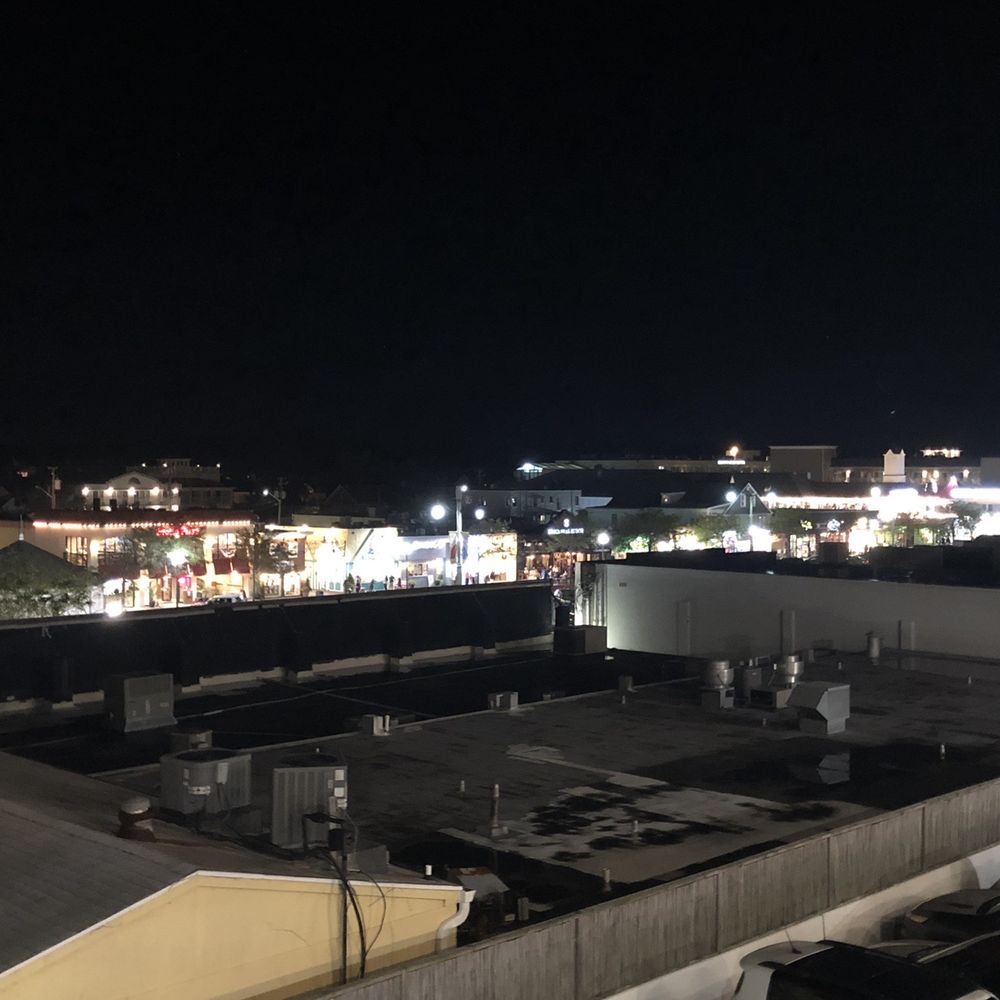 The Admiral on Baltimore - Night view from opposite side of hotel. Backside of Dolly's popcorn on the boardwalk. - Hotels Near Me - Rehoboth Beach, Delaware The Admiral on Baltimore - Night view from opposite side of hotel. Backside of Dolly's popcorn on the boardwalk. - Hotels Near Me - Rehoboth Beach, Delaware