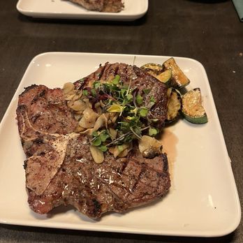 Toro - Porterhouse steak, medium rare with Zucchini - Steakhouses Near Me - South Jordan, Utah Toro - Porterhouse steak, medium rare with Zucchini - Steakhouses Near Me - South Jordan, Utah