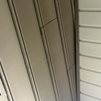 Moreno Construction & Design - Water dripping down the side of the house through a newly installed roof - General Contractors Near Me Moreno Construction & Design - Water dripping down the side of the house through a newly installed roof - General Contractors Near Me