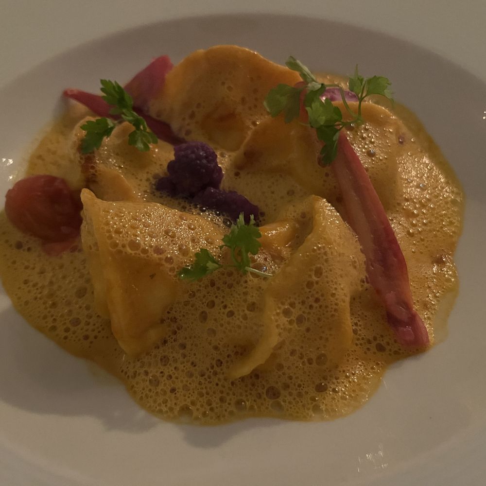 Tourmaline - MAINE LOBSTER CAPPELLACCI
roasted fennel, purple cauliflower, haricot verts confit tomato, homardine sauce - New American Near Me - Forest Hills, New York Tourmaline - MAINE LOBSTER CAPPELLACCI
roasted fennel, purple cauliflower, haricot verts confit tomato, homardine sauce - New American Near Me - Forest Hills, New York
