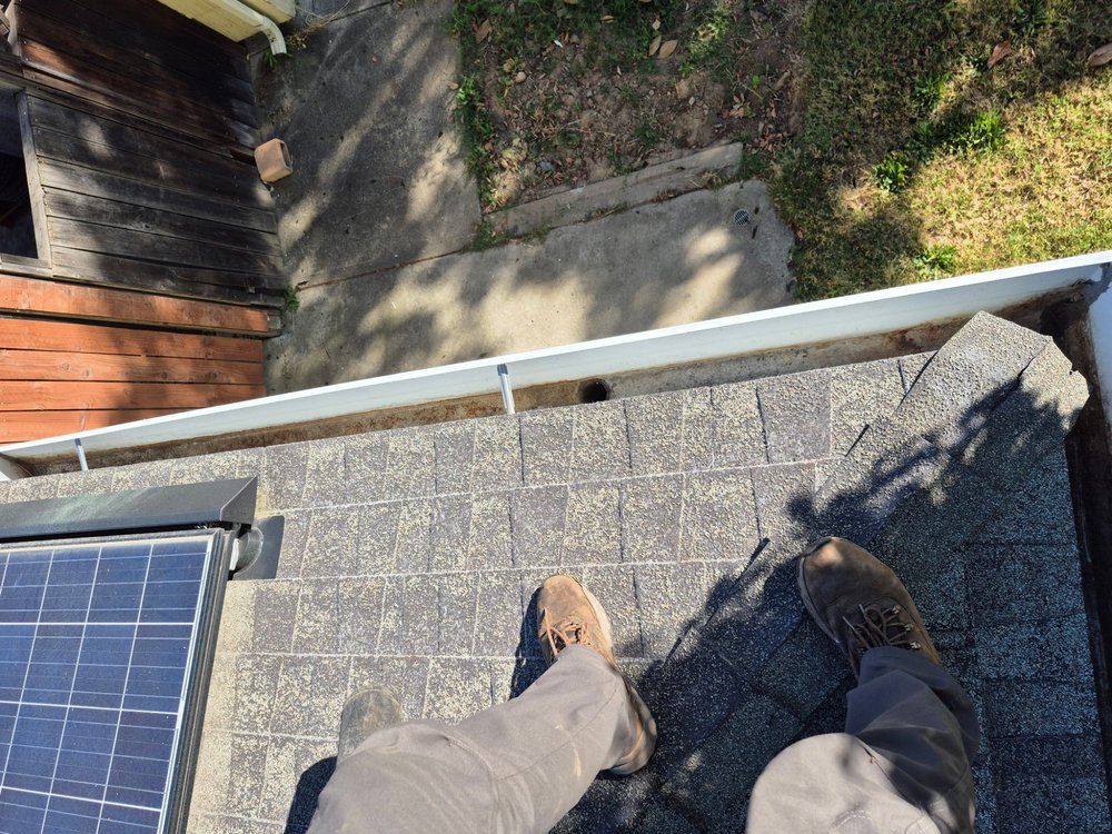 Slide of Cleaning Gutters Service