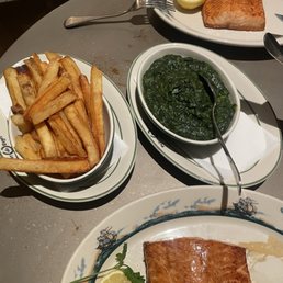 Salmon, French fried potatoes and creamed spinach Salmon, French fried potatoes and creamed spinach