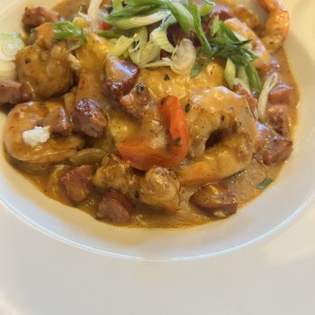 Mesler Kitchen Bar Lounge - Shrimp & Grits - Andouille sausage gives some heat but very tasty and filling. - New American Near Me - Chicago, Illinois Mesler Kitchen Bar Lounge - Shrimp & Grits - Andouille sausage gives some heat but very tasty and filling. - New American Near Me - Chicago, Illinois