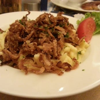 Der Andechser im Ratskeller - Cheesy spatzel served with fried onion on top and a side salad. - German Near Me - Wiesbaden, HE Der Andechser im Ratskeller - Cheesy spatzel served with fried onion on top and a side salad. - German Near Me - Wiesbaden, HE