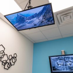Z Dentistry - TVs on the ceiling for entertainment.