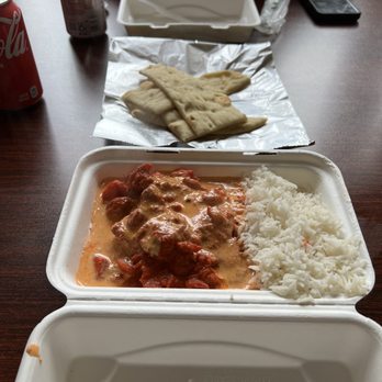 Bombay Curry - From top to bottom:  butter chicken with rice, plain naan, tikka masala with rice. - Indian Near Me - Skagway, Alaska
