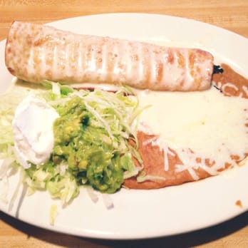El Azteca Mexican Restaurant - Lunch Chimichanga (got mine with chicken, fried, along with refried beans) can't wait to dig in! - Mexican Near Me - Virginia Beach, Virginia El Azteca Mexican Restaurant - Lunch Chimichanga (got mine with chicken, fried, along with refried beans) can't wait to dig in! - Mexican Near Me - Virginia Beach, Virginia