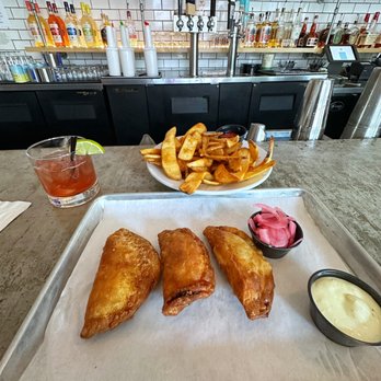 West Oak Nosh - Nosh pockets, beef fat fries, and pomegranate Margarita. - German Near Me - Lodi, California West Oak Nosh - Nosh pockets, beef fat fries, and pomegranate Margarita. - German Near Me - Lodi, California