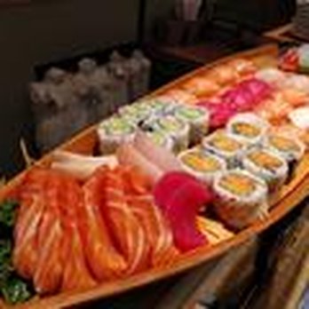 Sushi Won - a long wooden boat filled with sushi - Japanese Near Me - Kincardine, Ontario Sushi Won - a long wooden boat filled with sushi - Japanese Near Me - Kincardine, Ontario