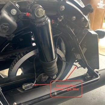 Motorcycle Tire Center - Rear Fender Light disconnected and dangling (Dead battery issue) - Motorcycle Repair Near Me - Orange, California Motorcycle Tire Center - Rear Fender Light disconnected and dangling (Dead battery issue) - Motorcycle Repair Near Me - Orange, California