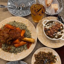 KooKoo Restaurant & Lounge - Lamb entree, kashkebademjan (eggplant), zeitoon parvarde (olive, walnut, herb & pomegranate appetizer), azizam cocktail.