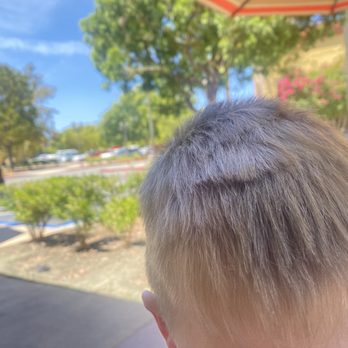 Headliners Barbershop - Multiple ugly, hard defined lines at the top of his head from the shears. - Barbers Near Me - Menifee, California Headliners Barbershop - Multiple ugly, hard defined lines at the top of his head from the shears. - Barbers Near Me - Menifee, California