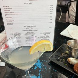 My lychee garnish. You can see the drink description immediately above the lemon.