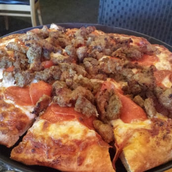 Pizzeria Classico - Looking at a great pizza. Pepperoni sausage and meatball. Very good. - Pizza Near Me - Folsom, California