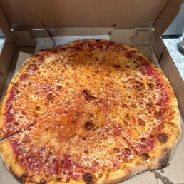 Cheese pizza Italian style crispy extra sauce - A cheese pizza with melted cheese and a crispy crust in an open cardboard pizza box.