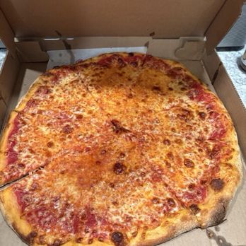 D & E Pizza & Subs - Cheese pizza Italian style crispy extra sauce - A cheese pizza with melted cheese and a crispy crust in an open cardboard pizza box. - Pizza Near Me - Canton, Massachusetts