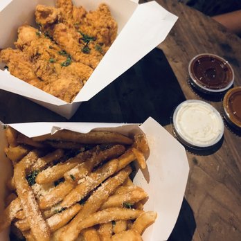 Sticky's - Large - 4 Chicken Fingers and truffle Truffle Parm Fries - Fast Food Near Me - New York, New York Sticky's - Large - 4 Chicken Fingers and truffle Truffle Parm Fries - Fast Food Near Me - New York, New York