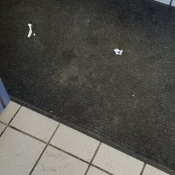 Taco Bell - Trash on the floor.