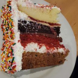 a slice of cake on a plate a slice of cake on a plate