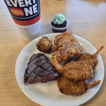 Golden Corral Buffet & Grill - Golden Corral, rare steak, fish, and shrimp. It was St. Patrick's Day, so they had a nice chocolate cupcake with green frosting on top. - American Near Me - Rockford, Illinois Golden Corral Buffet & Grill - Golden Corral, rare steak, fish, and shrimp. It was St. Patrick's Day, so they had a nice chocolate cupcake with green frosting on top. - American Near Me - Rockford, Illinois