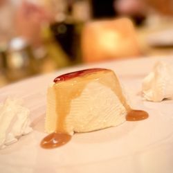 Dametra Cafe - Panna CottaG Northern Italian dessert of sweetened vanilla cream pudding. Served with raspberry sauce. 15