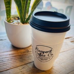 Newport Coffee - I love taking photos like this... so cute in front of the mini snake plant on their counter!