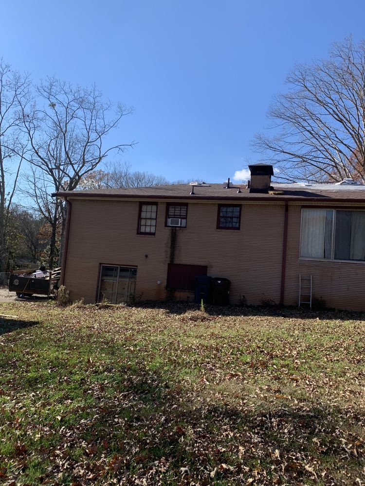 Slide of Whitaker Roofing Company