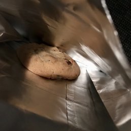 a cookie on a piece of tin foil a cookie on a piece of tin foil