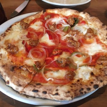 Piacere - Pizza with tomatoes, mozzarella, onions, roast peppers, and spicy Italian sausage - Pizza Near Me - New York, New York Piacere - Pizza with tomatoes, mozzarella, onions, roast peppers, and spicy Italian sausage - Pizza Near Me - New York, New York