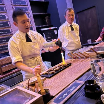 Sushi by Scratch Restaurants - Torching time! - Sushi Bars Near Me - Seattle, Washington