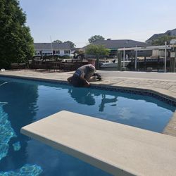 Picture of New Jersey pool patcher looking for a leak in our pool