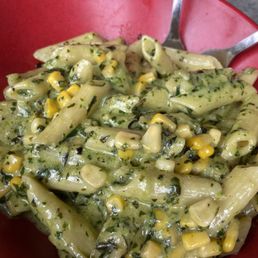 Creamy pesto penne with corn