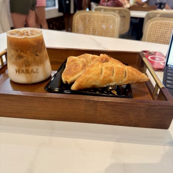 Haraz Coffee House - Iced Haraz Latte (16oz) Arab Pies (Savory) (chicken/spinach) Beef Puffs - Coffee & Tea Near Me - Pembroke Pines, Florida