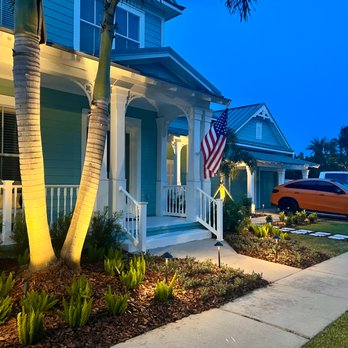 Trimen Landscape - the front of a house at night - Landscaping Near Me - Seffner, Florida Trimen Landscape - the front of a house at night - Landscaping Near Me - Seffner, Florida
