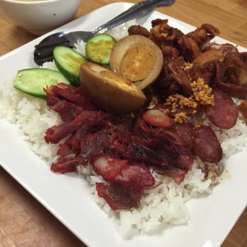 Borneo Eatery - Rice dish with meat (on the cover of the menu) - Indonesian Near Me - Alhambra, California Borneo Eatery - Rice dish with meat (on the cover of the menu) - Indonesian Near Me - Alhambra, California