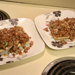 Dollar Tree - .. recent dinner - canned beans (w/molasses) w/diced leftover chicken & onion, over ciabatta bun.